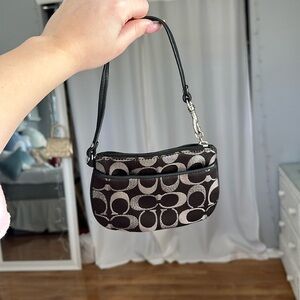 SOLD AUTHENTIC Coach black and silver wristlet
